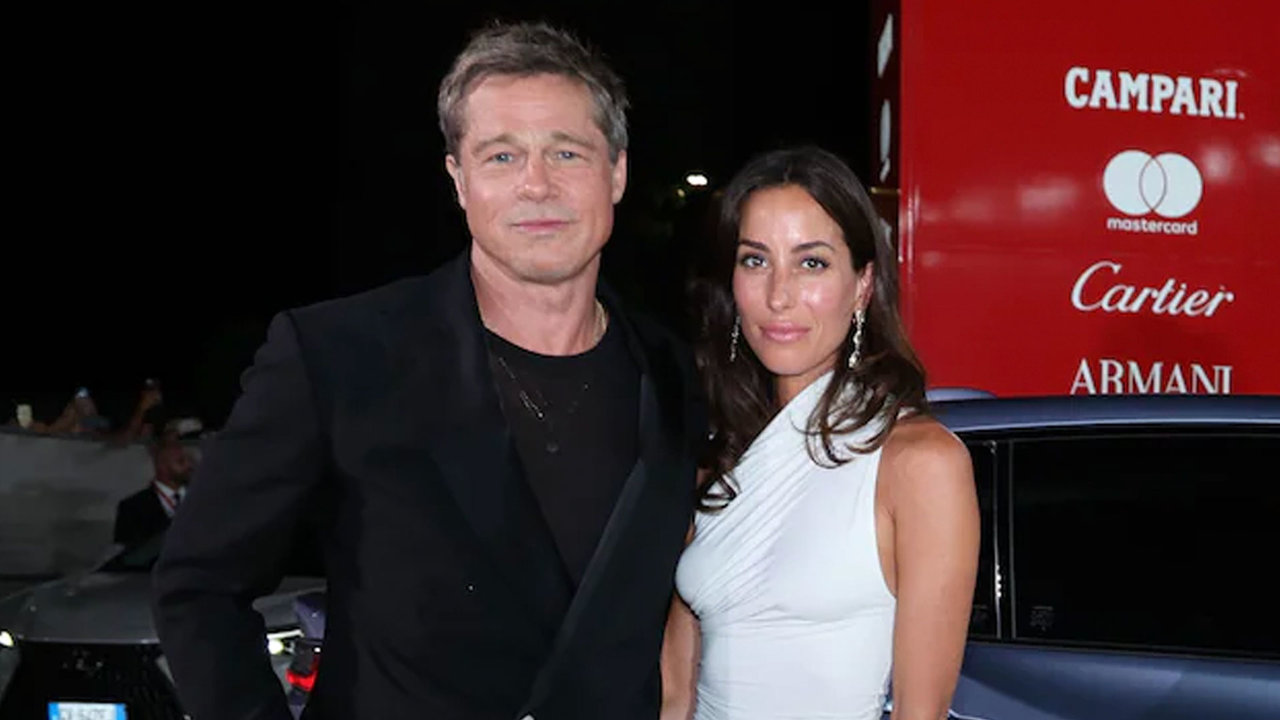 Brad Pitt junto a Inés de Ramón en el Festival de Cine de Venecia